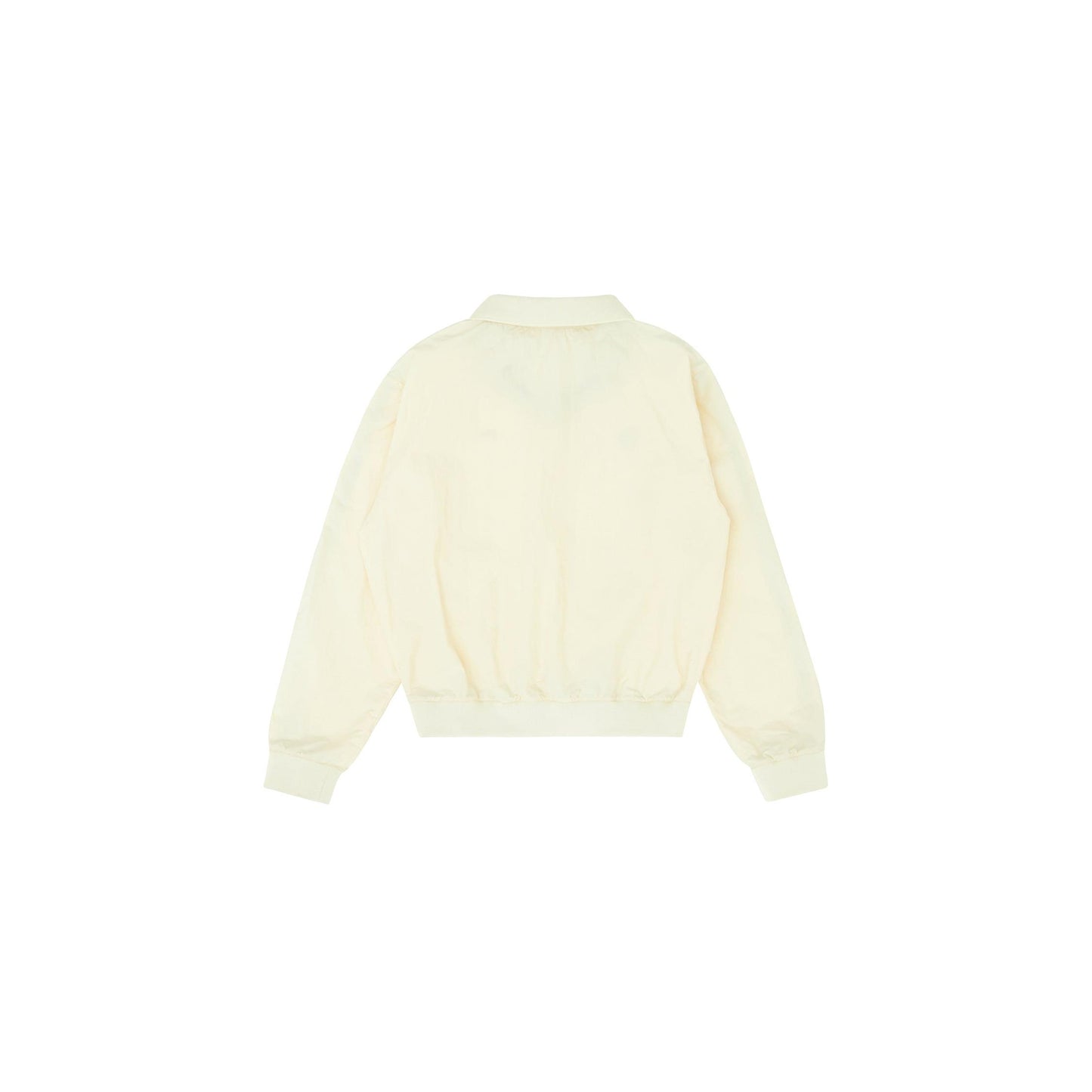 back view of the piv'vee club piste top in soft ivory with a relaxed fit and elastic cuffs