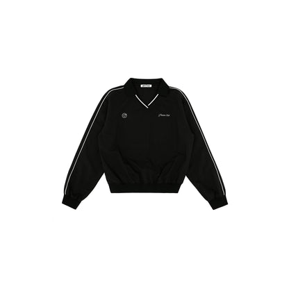 Piv'vee Club Piste Top in black with a relaxed fit and contrasting white detailing